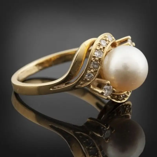 Elegant ring med perle og brillant i guld
